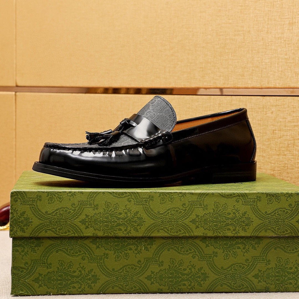 Gucci Tassel Monogram Loafers